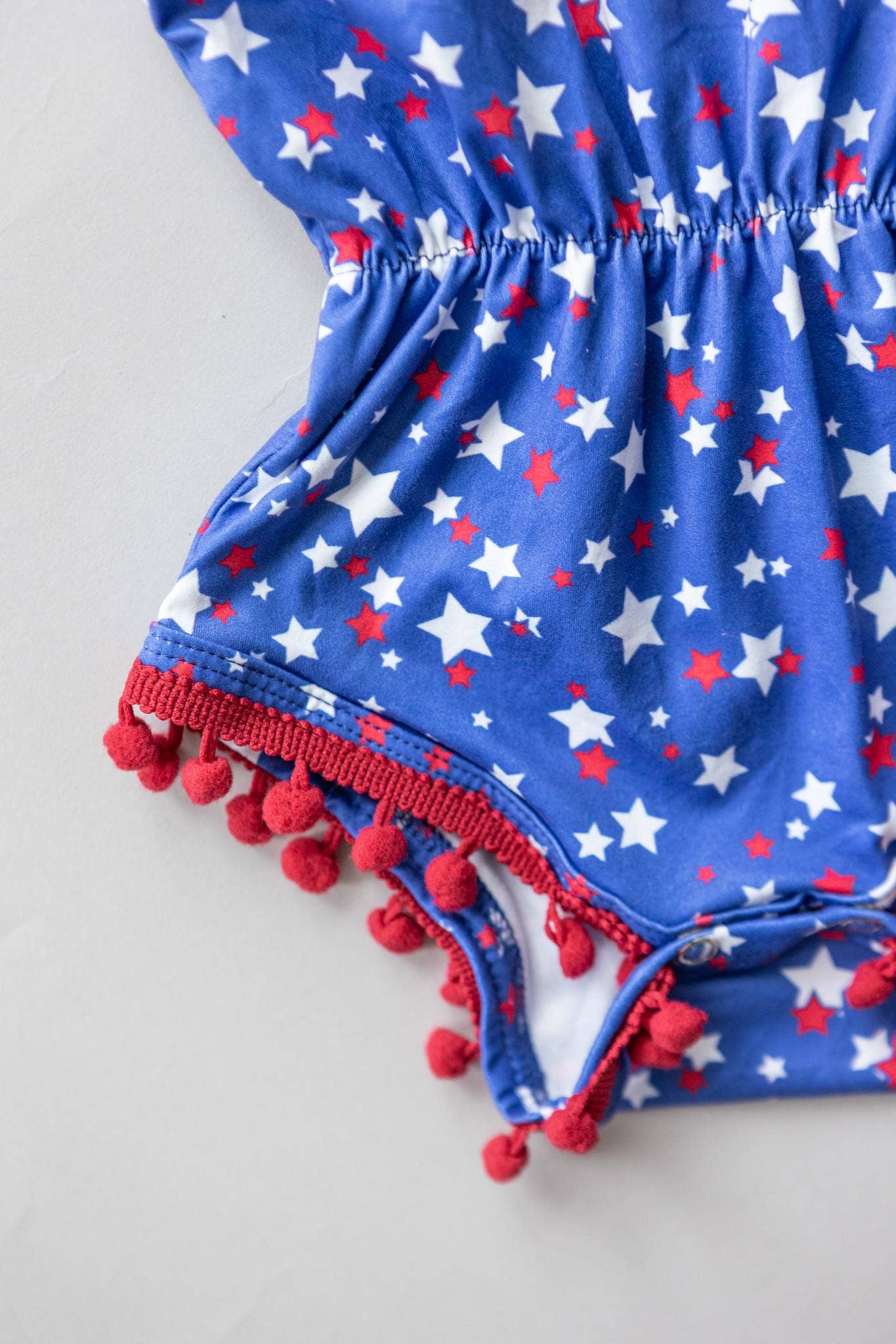 Star Bright Pom Pom Romper